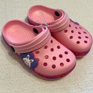 Pink CROCS style slippers